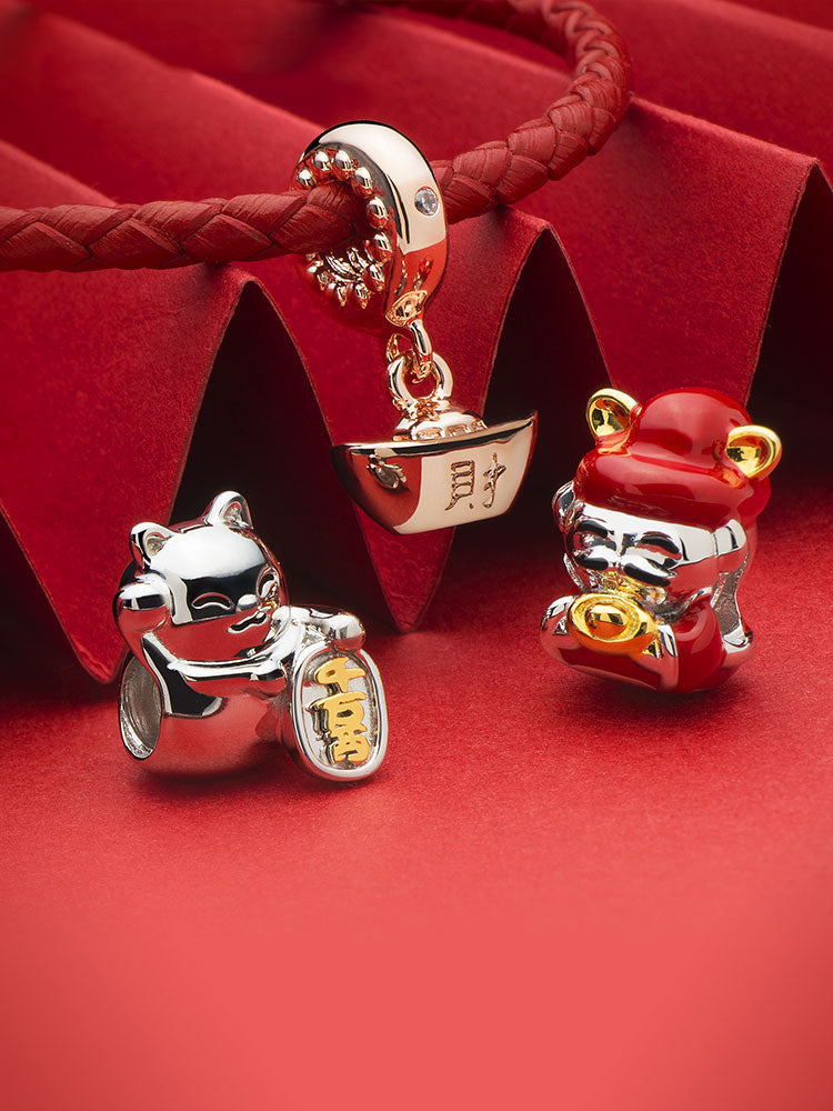 Fortune kitty charm bead styled with bracelet charms