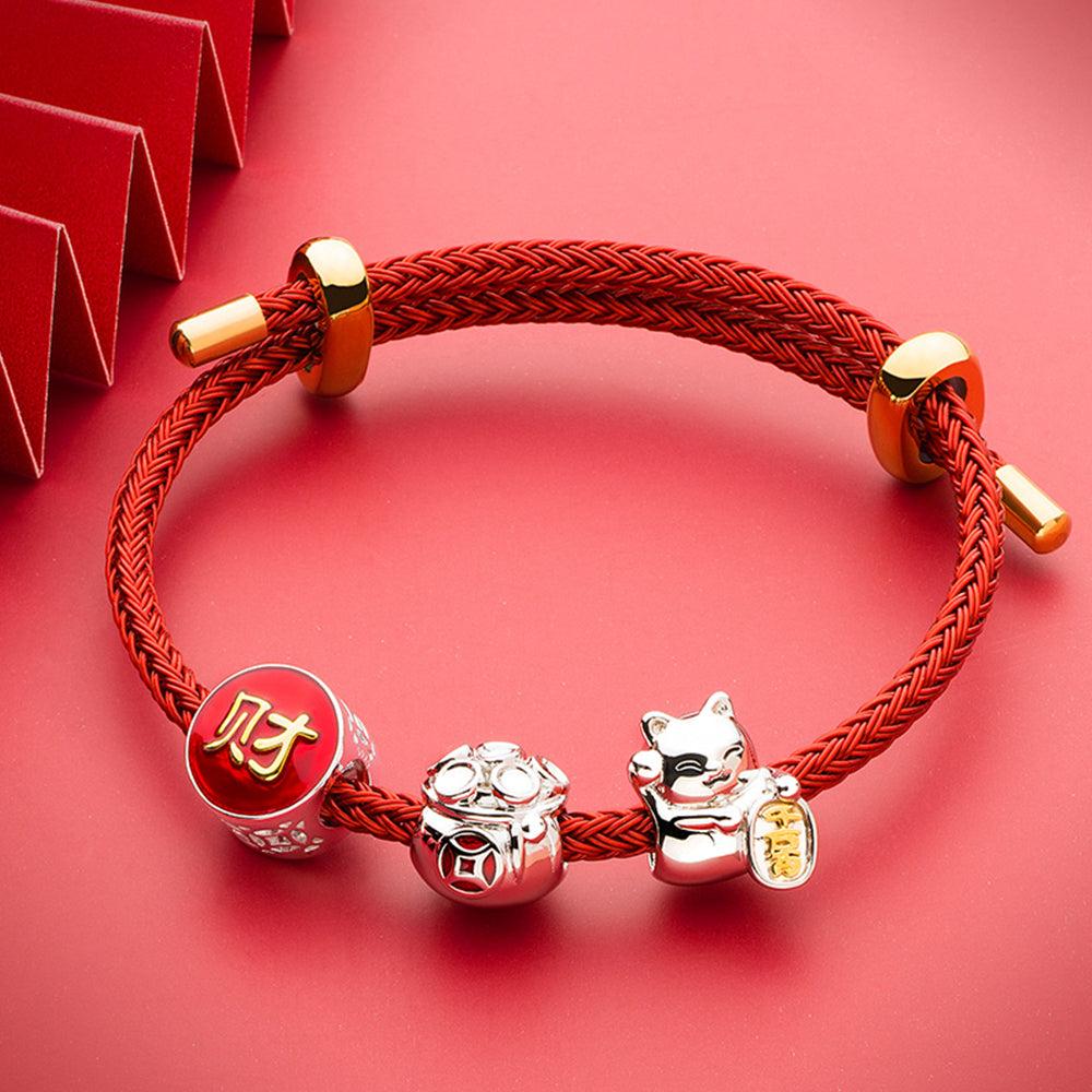Fortune Kitty charm bead combined with lucky red and gold charms on silver bracelet