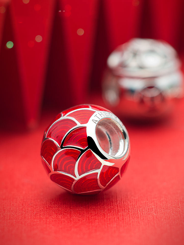 Fortune waves charm bead styled on charm bracelet symbolizing prosperity