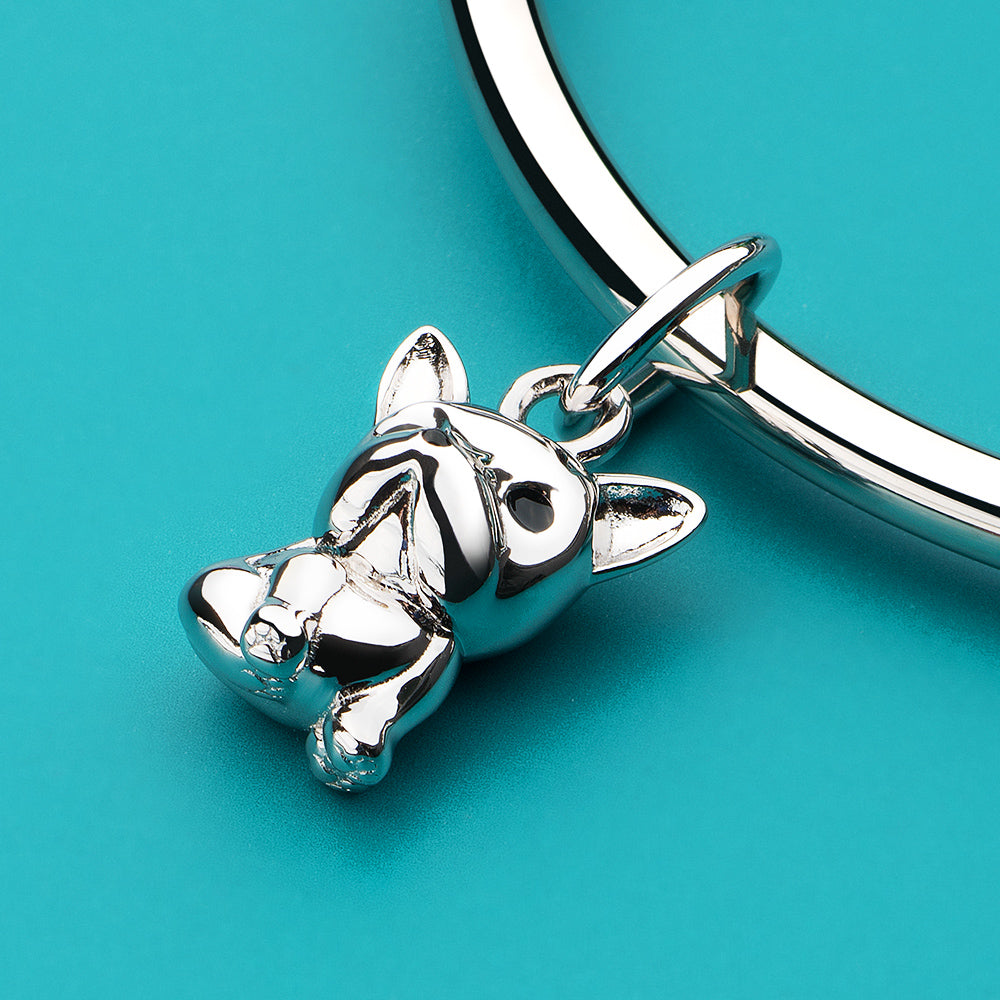 Scene photo of ATHENAIE Frenchie Love Dog Charm with enamel details