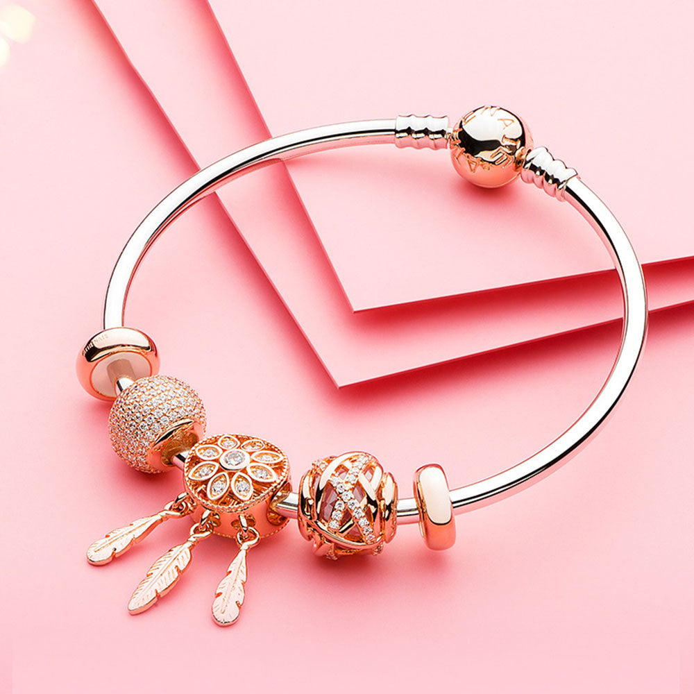 Golden Embrace rose gold charm bead styled with European bracelet