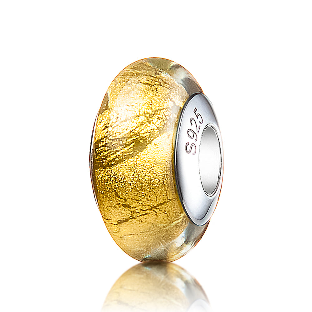 Golden Halo Murano glass charm with gold foil on white background