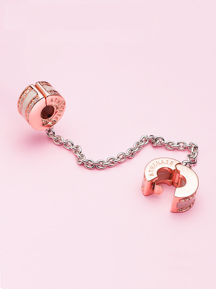 Golden harmony safety chain charm styled on charm bracelet by ATHENAIE