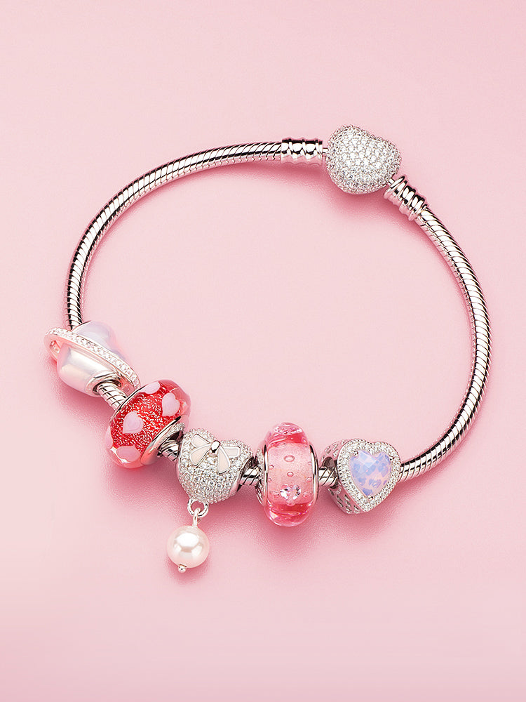 Pink embrace heart charm bead bracelet styling with silver charms
