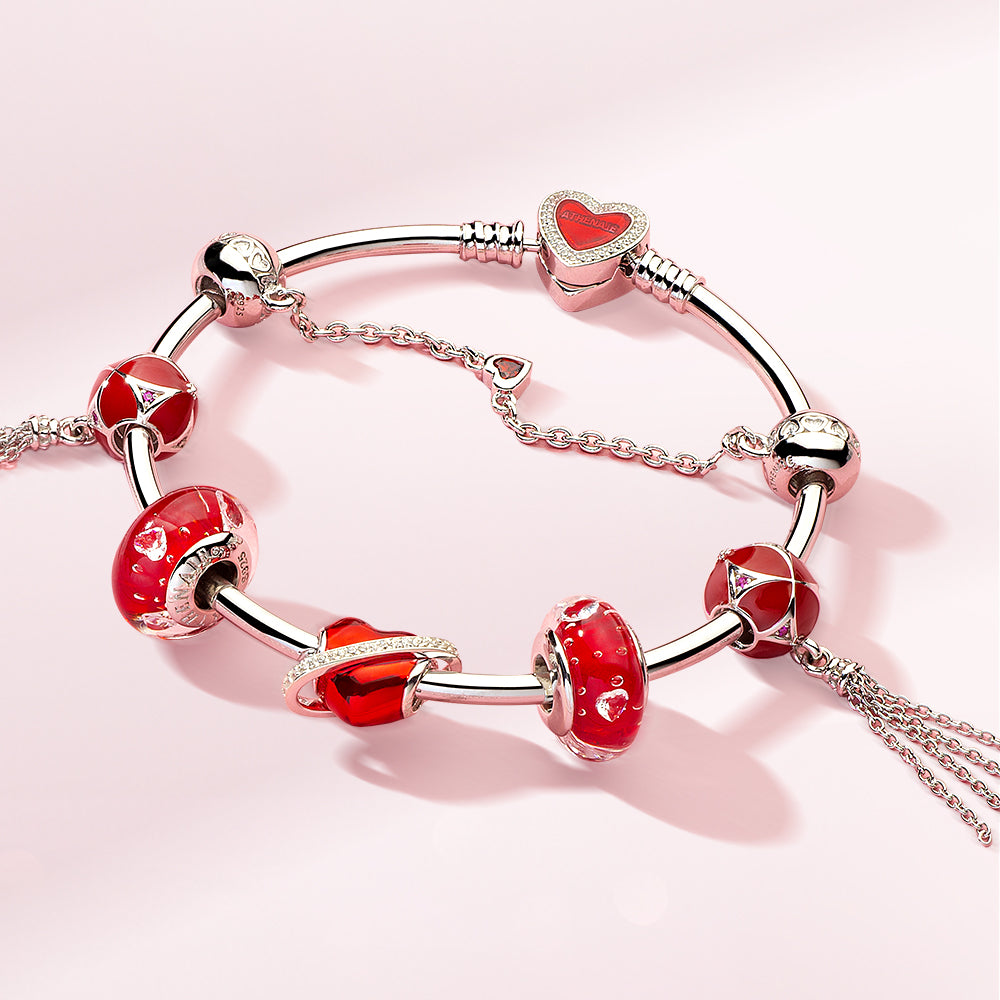 Heart Guard safety chain styled with silver heart charms on bracelet, elegant and protective charm accessory