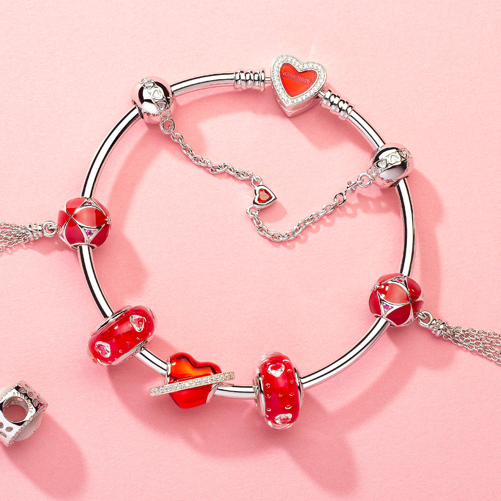Heart Guard safety chain paired with pink and CZ beads on bracelet, romantic jewelry design for women