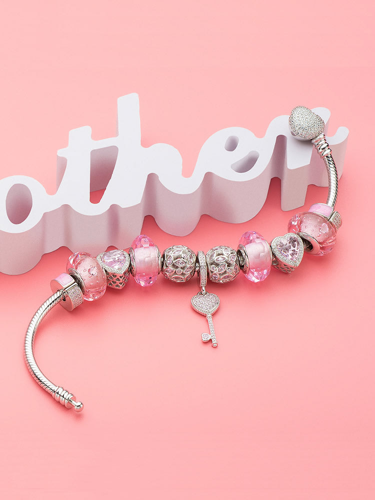 Sterling silver heart key dangle charm for bracelet styling inspiration