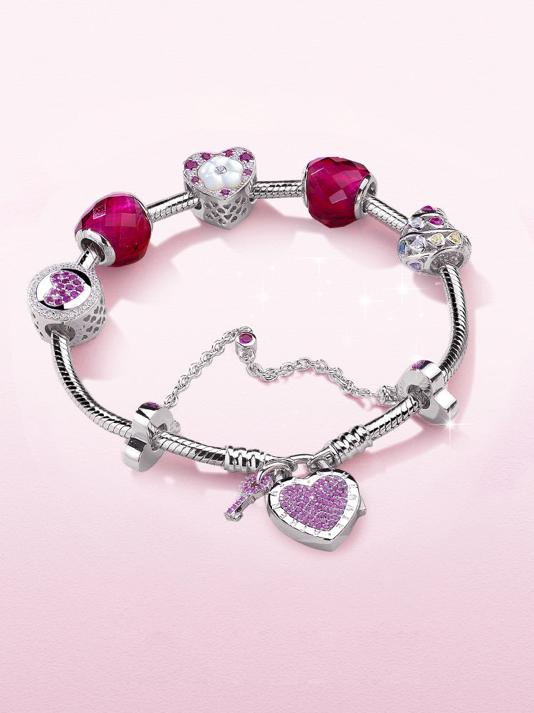 Sterling silver heart lock charm bracelet with charm beads