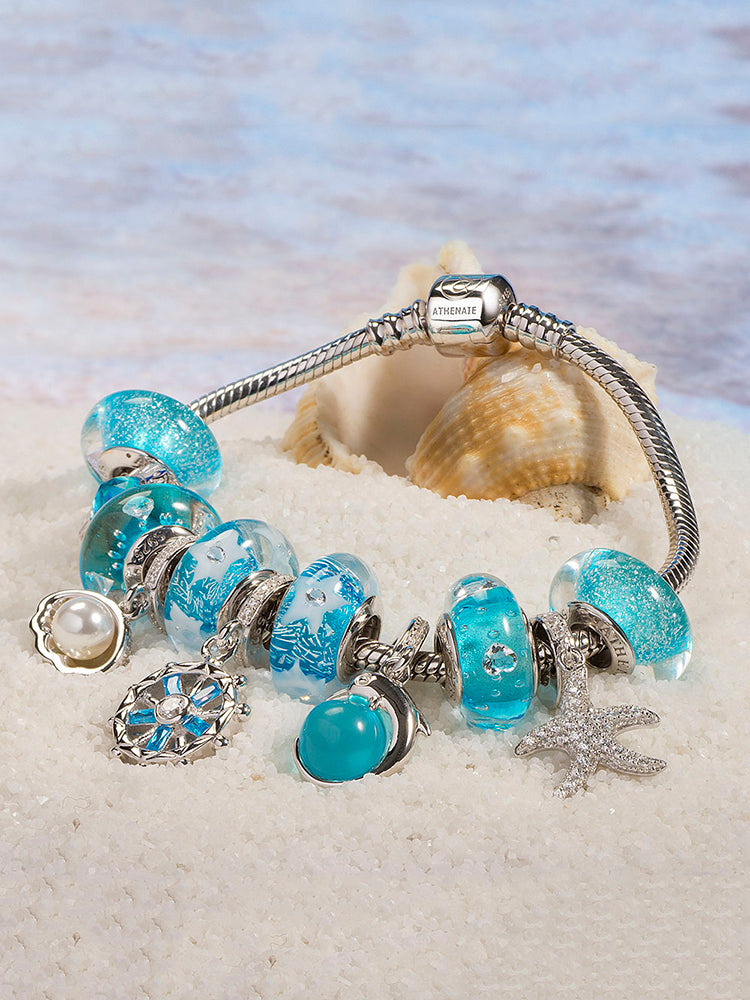 Heart murano glass charm styled on silver charm bracelet