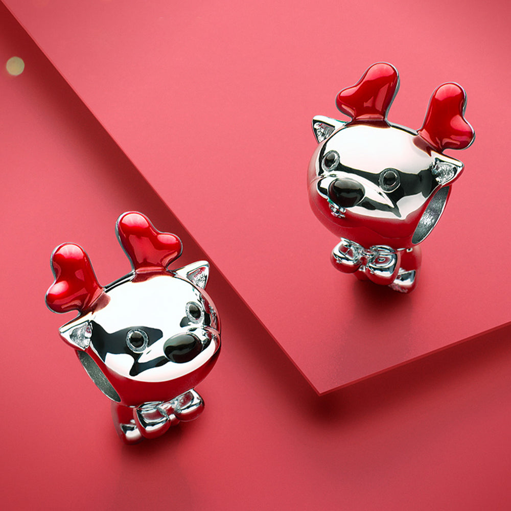 Festive scene featuring Jolly Reindeer Christmas charm with holiday decor – perfect bracelet bead