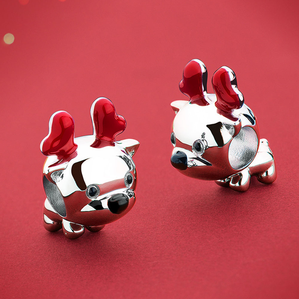 Holiday display of Jolly Reindeer Christmas charm with enamel red antlers – Christmas jewelry bead