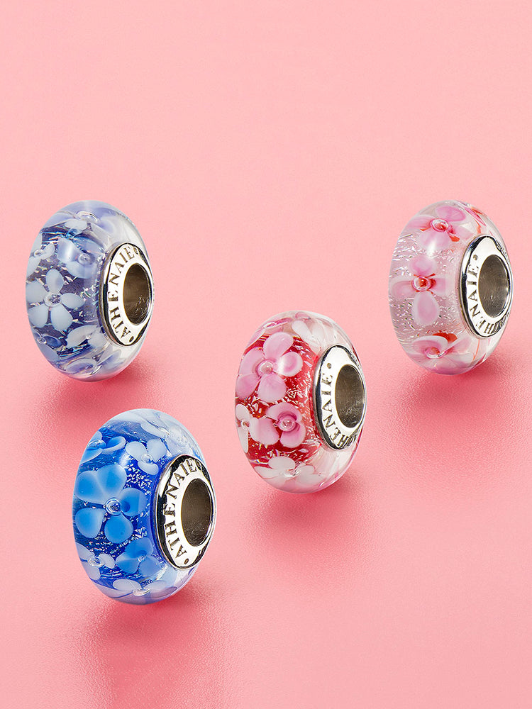 Lavender whisper murano glass charm styled on European snake chain bracelet