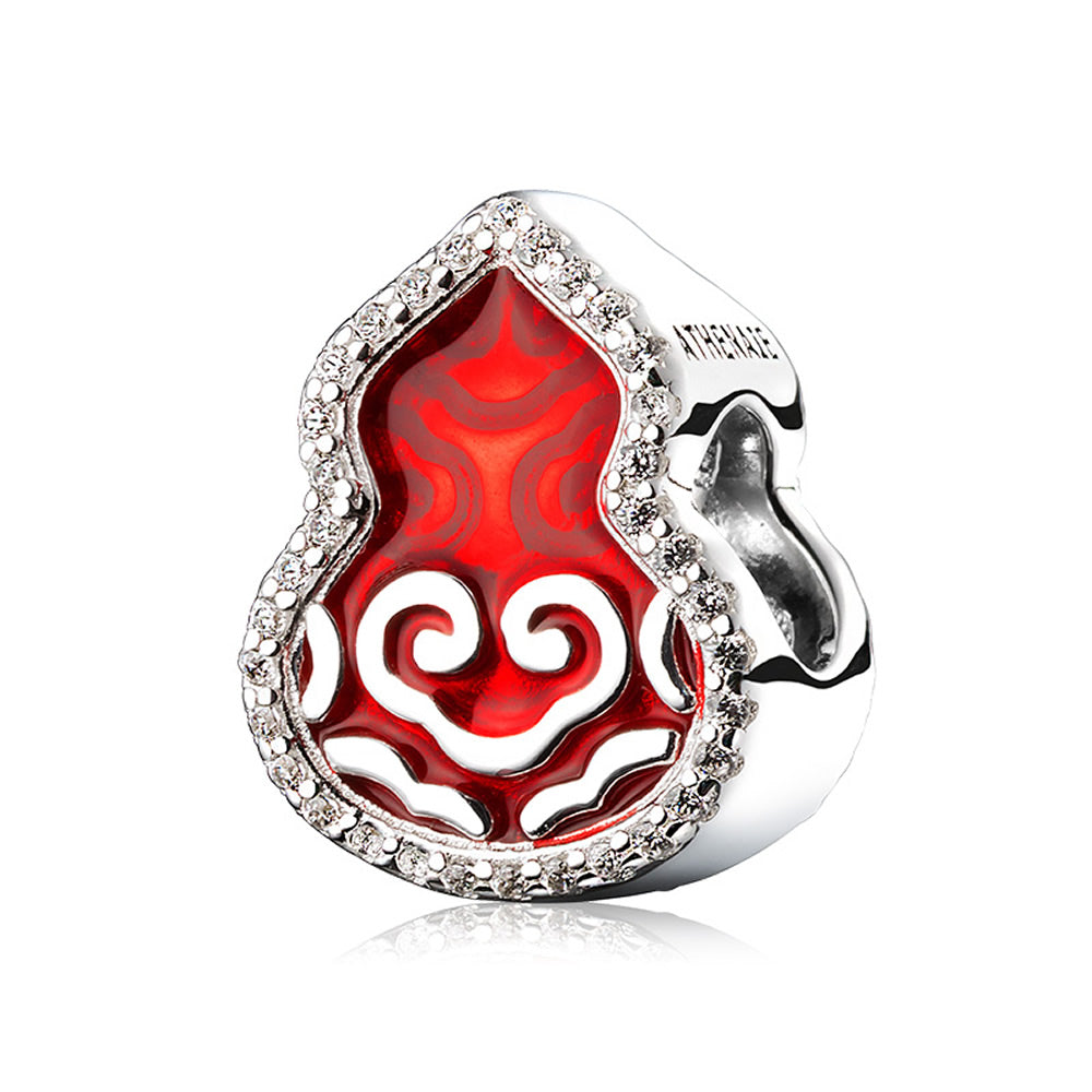 Lucky Gourd enamel charm bead displayed in festive scene.