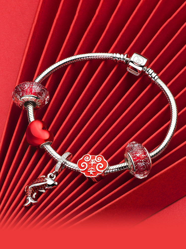 Lucky koi enamel charm pendant paired with sterling silver bracelet