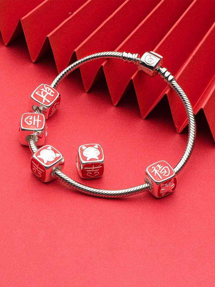 Lucky tiger enamel charm bead paired with sterling silver bracelet