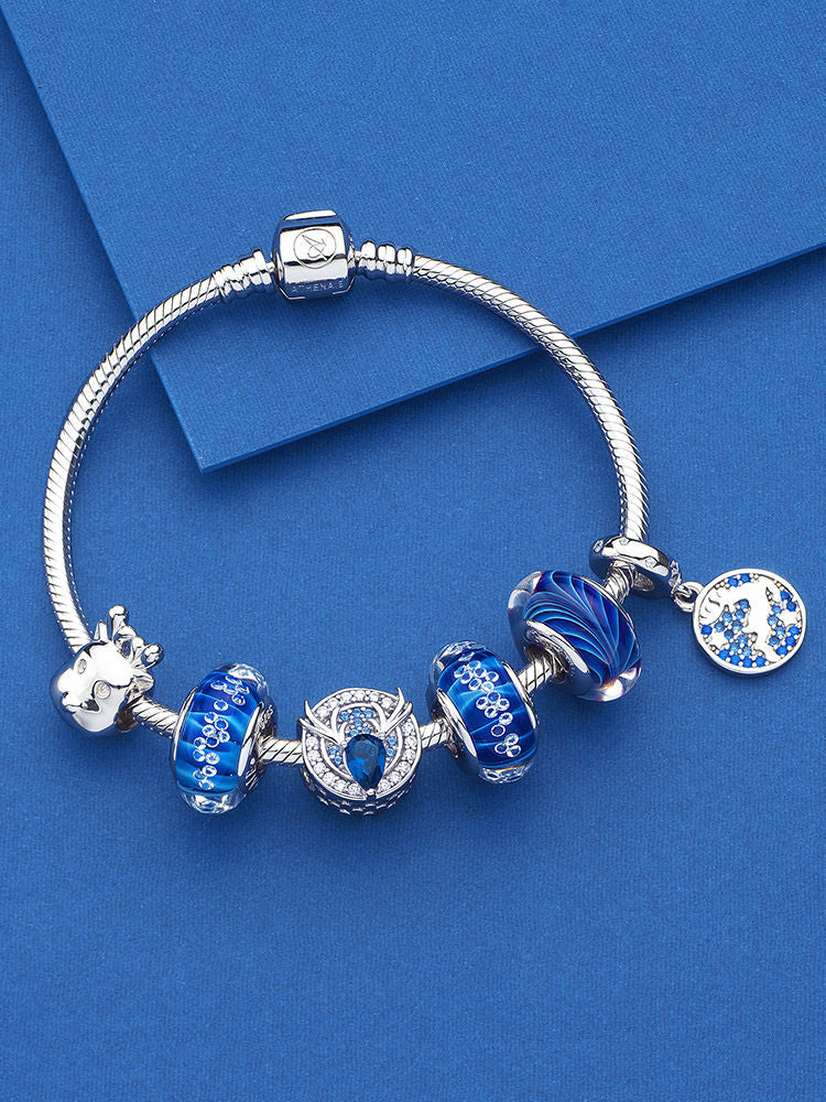 Midnight wave murano glass charm paired with sterling silver bracelet