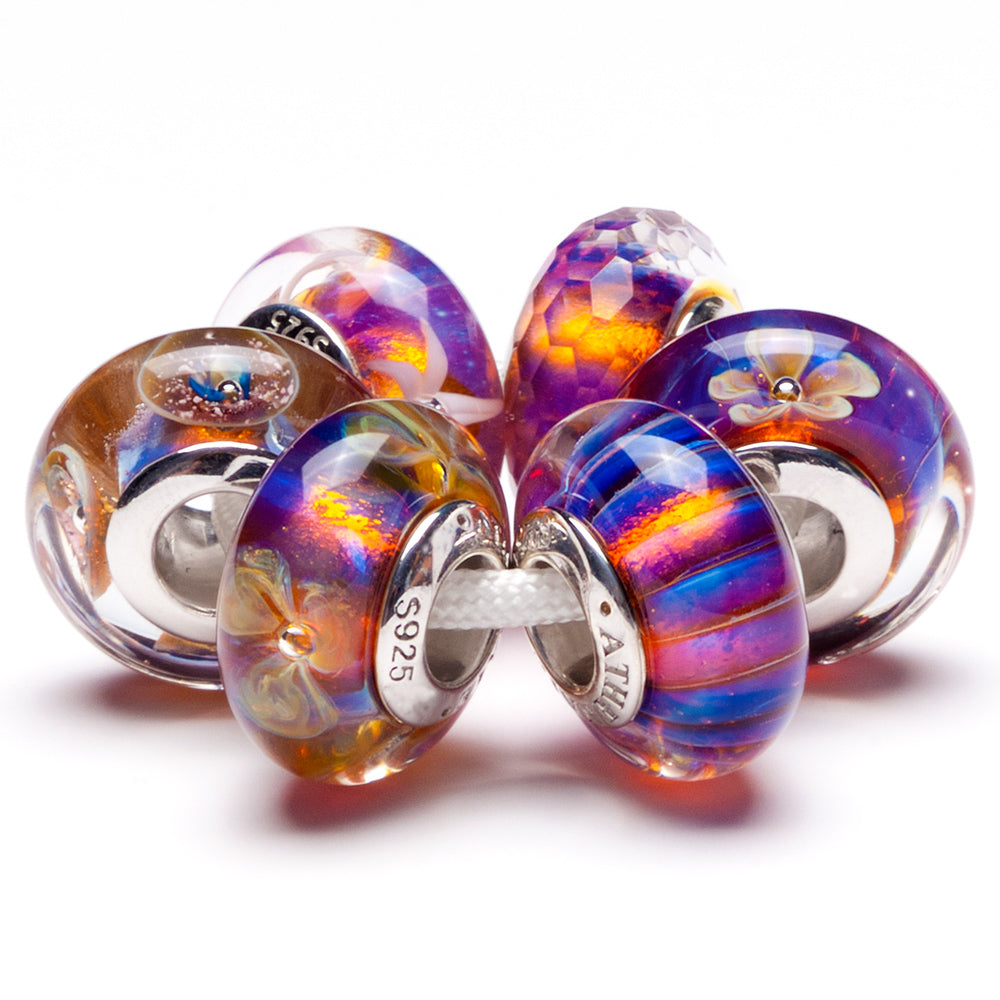 Close-up of Twilight Prism Mist Murano charm showing color gradient