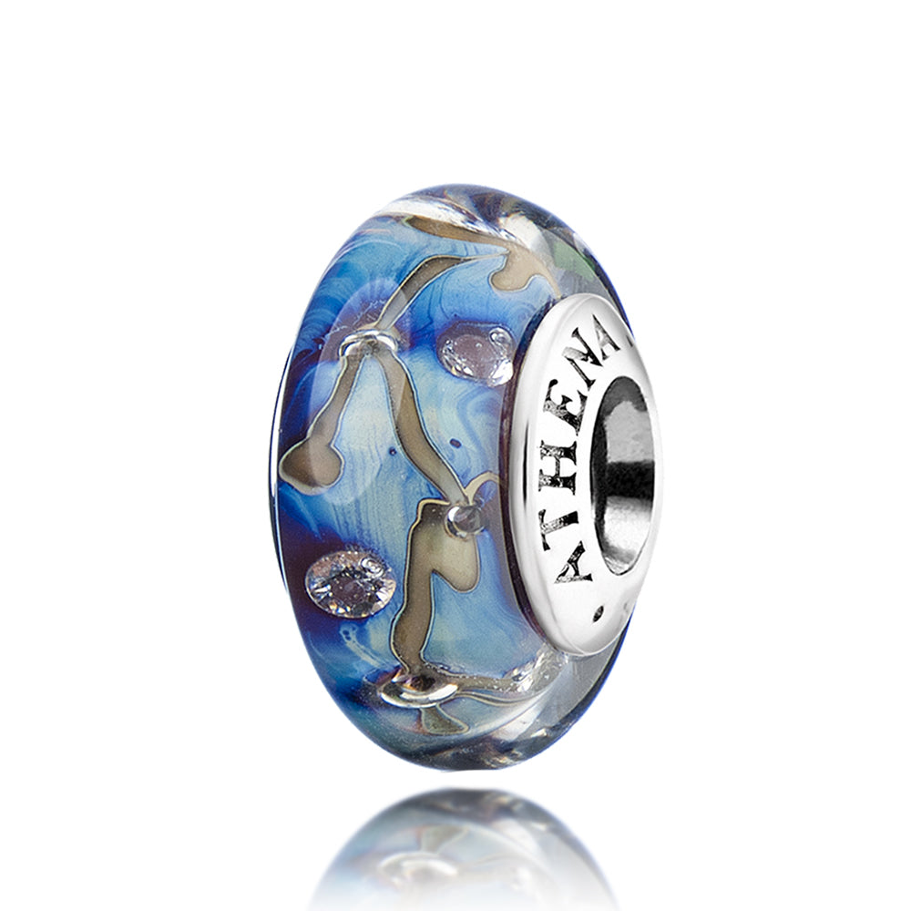 Front view of Celestial Stream Murano glass charm with sterling silver core