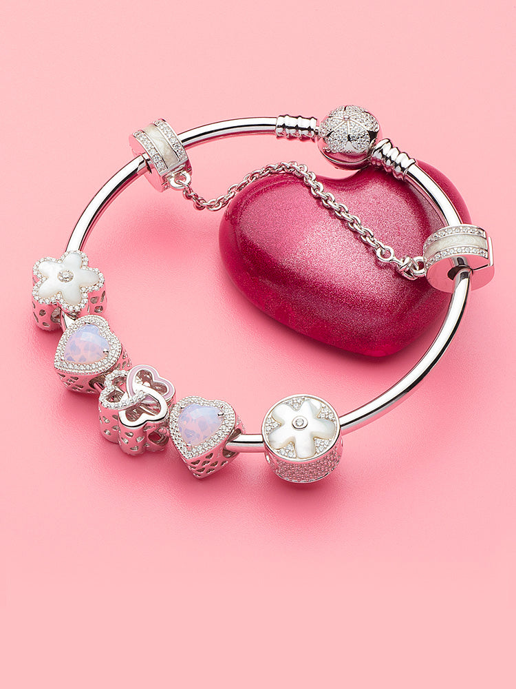 Charm bracelet look featuring moonlit flower charm bead