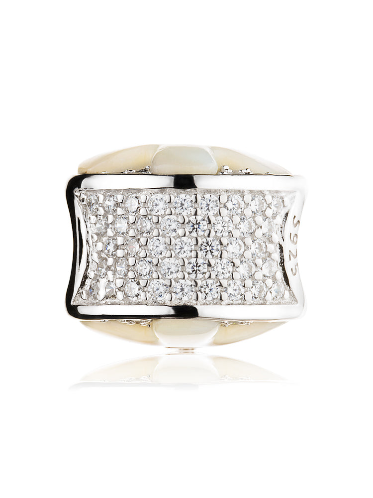 Side view of moonlit flower charm bead in sterling silver