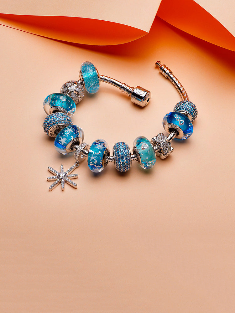 Sterling silver charm bracelet with Moonlit Heart white enamel charm bead