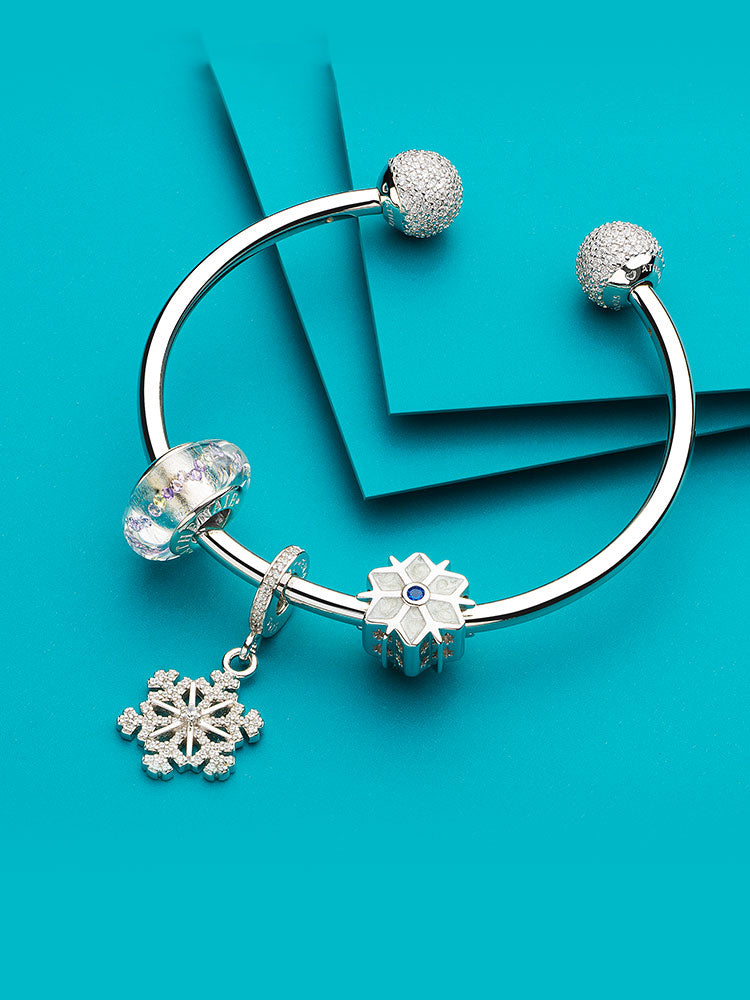 Crystal Aurora Murano glass bead paired with sterling silver bracelet