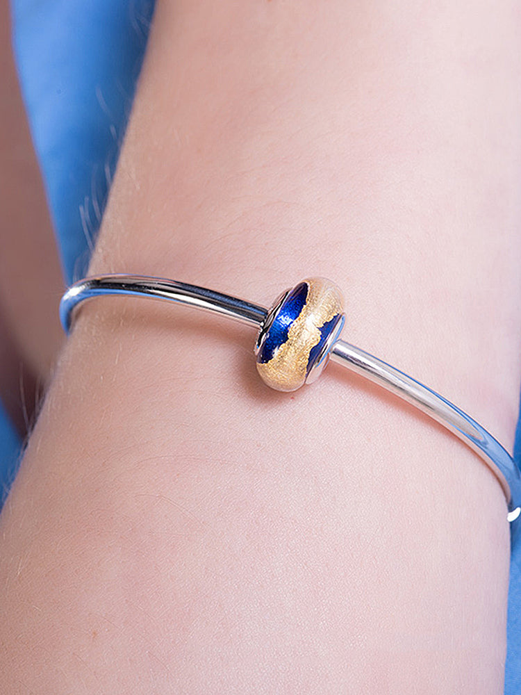 Murano glass charm bead bracelet worn by model