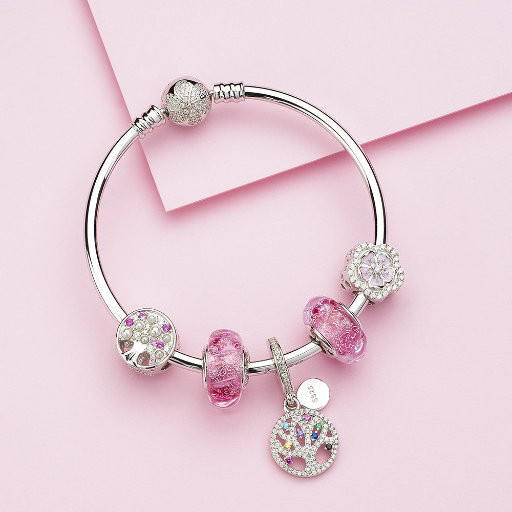 Red Murano charm styled on silver bracelet with ATHENAIE Rose Wave glass bead, emotional gift