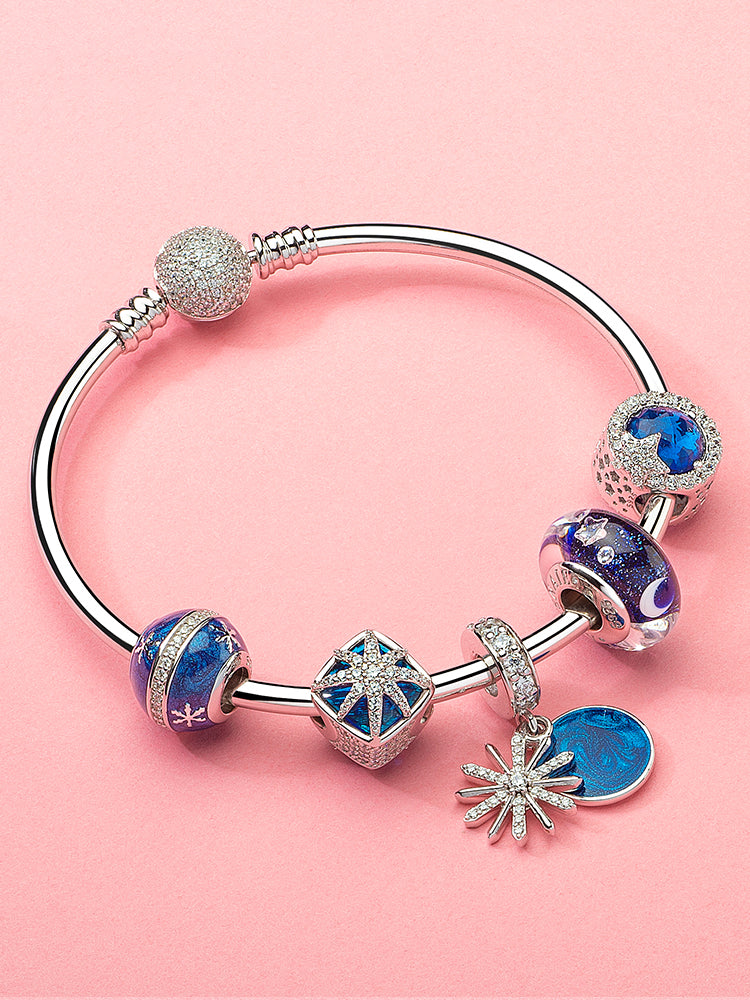 Moon and star murano glass charm styled on bracelet