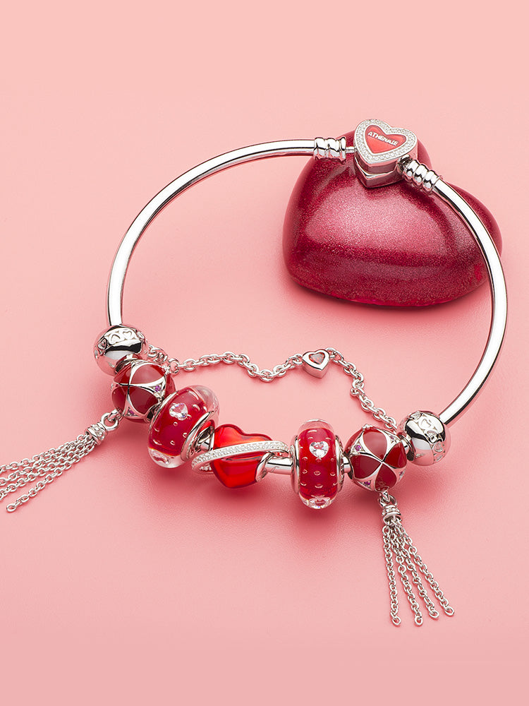 Crimson heart murano glass charm bead styled on charm bracelet