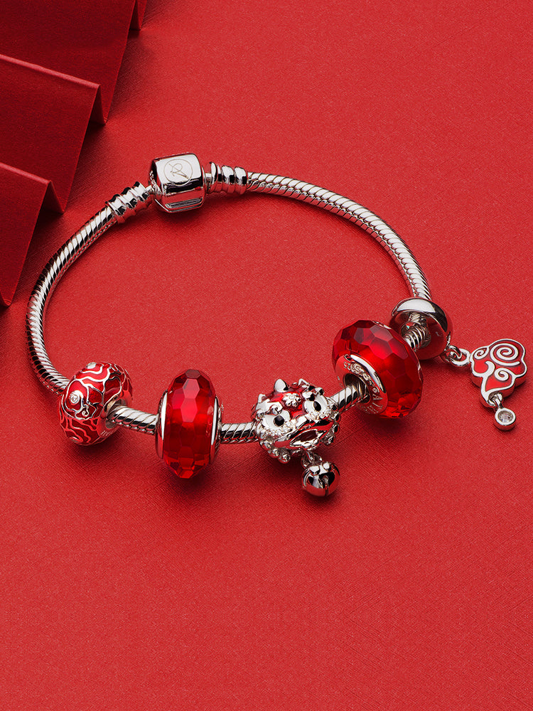 Ruby murano glass charm bead styled on charm bracelet