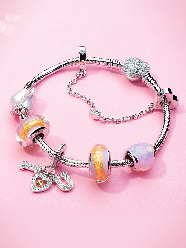 Murano glass heart charm bead styled with silver charms