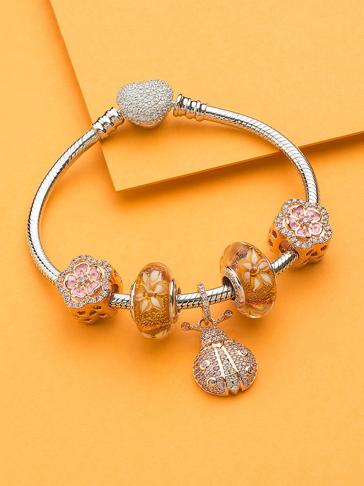 Murano glass daisy charm bead styled on charm bracelet