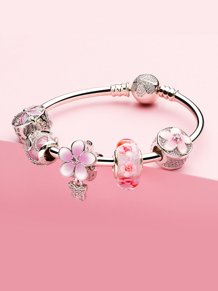 Murano glass flower charm bead styled on charm bracelet