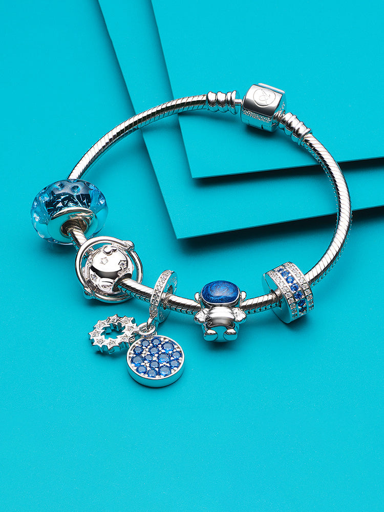 Murano glass galaxy charm bead styled with bracelet charms by ATHENAIE