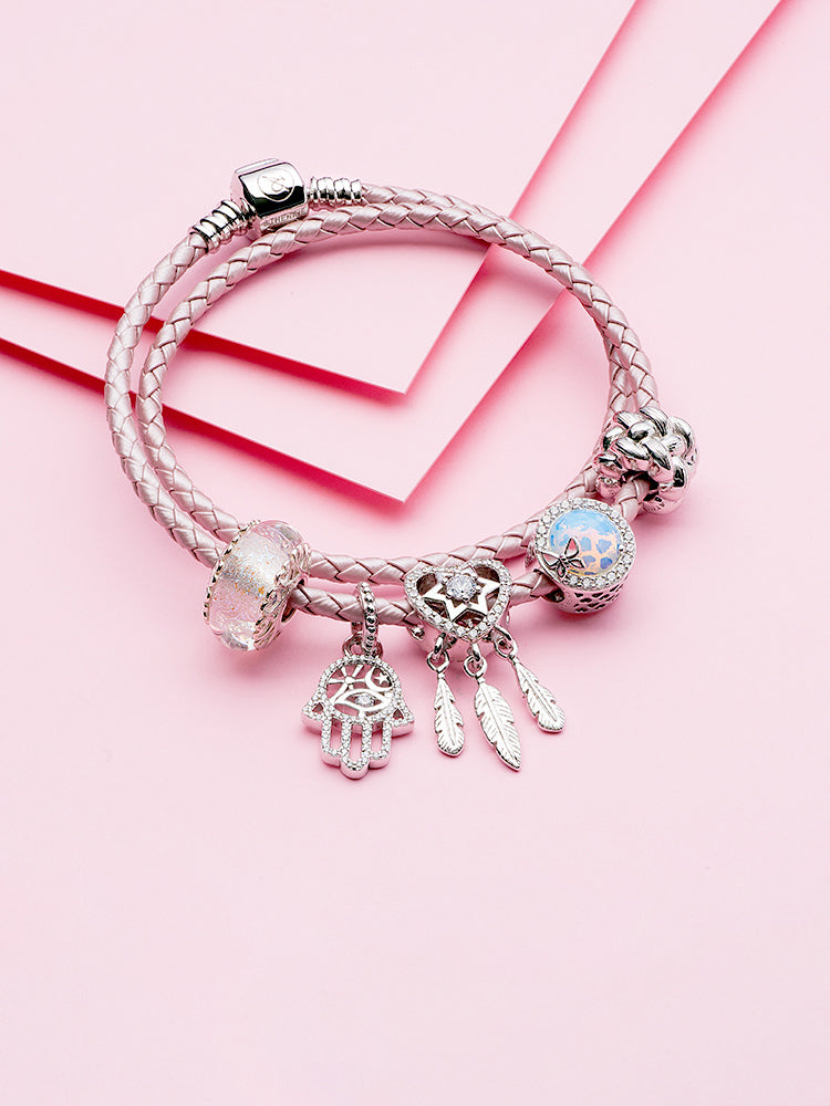 Murano glass heart charm bead styled on bracelet