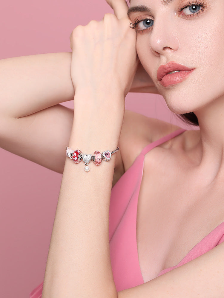 Murano glass heart charm bead bracelet styling on model wrist