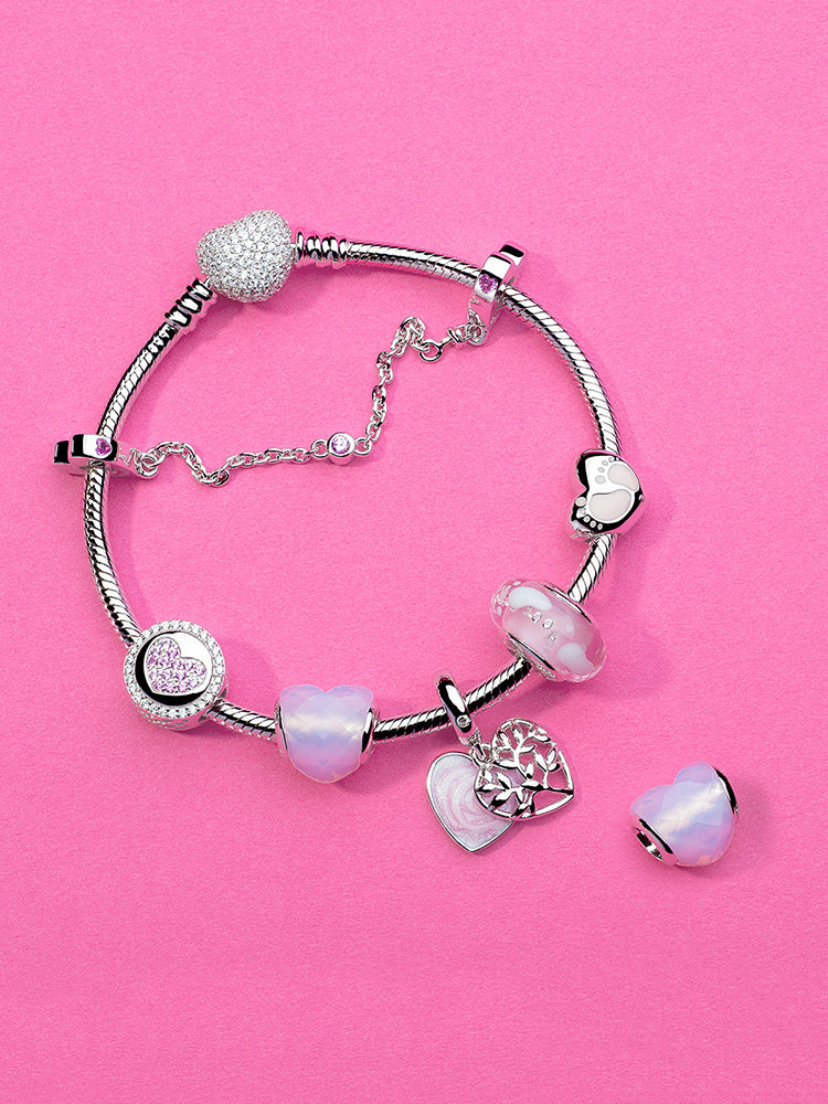 Bracelet styling featuring baby footprint charm bead