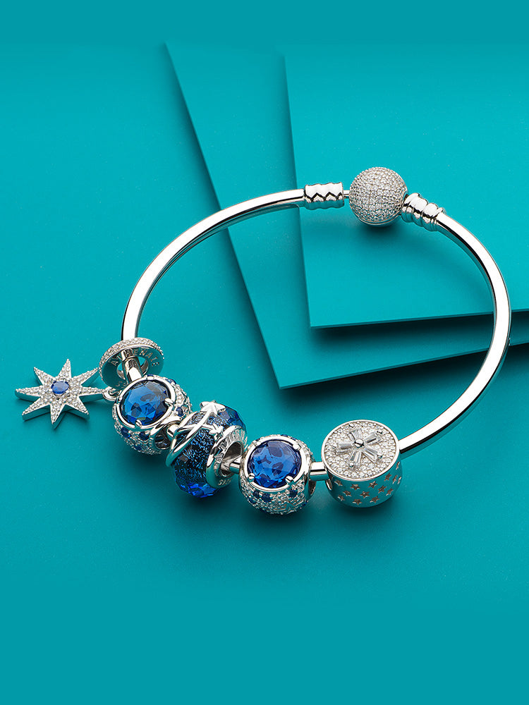 Northern star pendant charm styled on bracelet by ATHENAIE