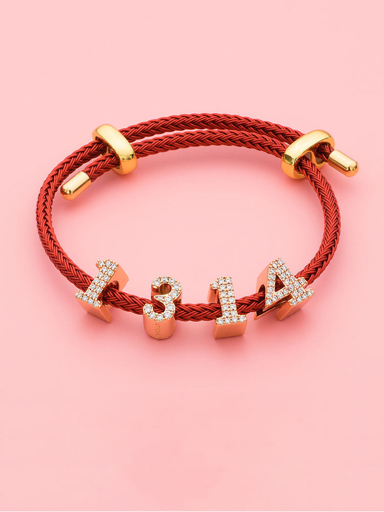 Rose gold number charm bead bracelet detail