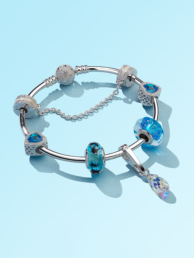 Ocean Breath Murano glass bead charm paired with ATHENAIE snake chain bracelet