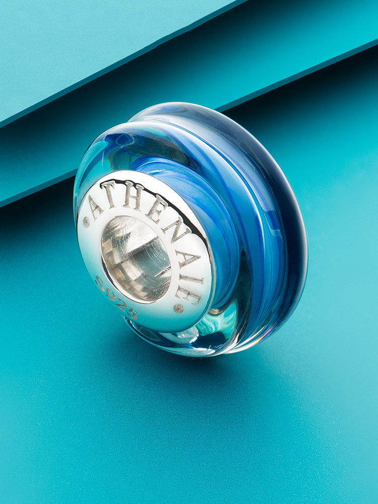 Ocean wave Murano glass charm bead styled on bracelet