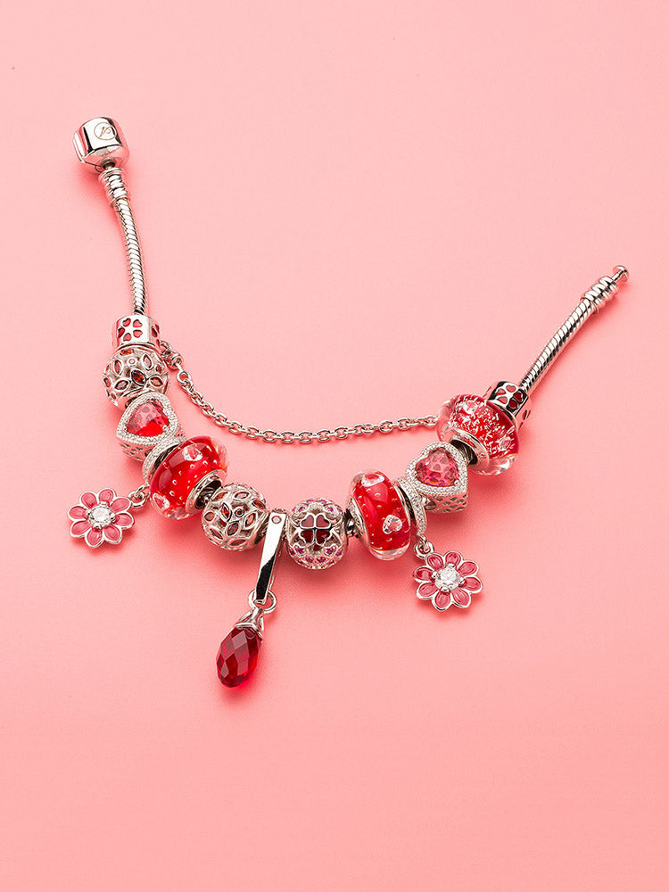 Sterling silver passion heart charm bead paired with bracelet charms