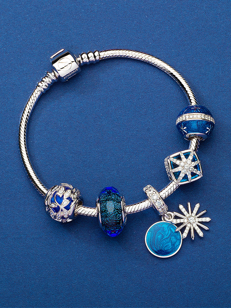 Celestial tree charm styled on European-style charm bracelet