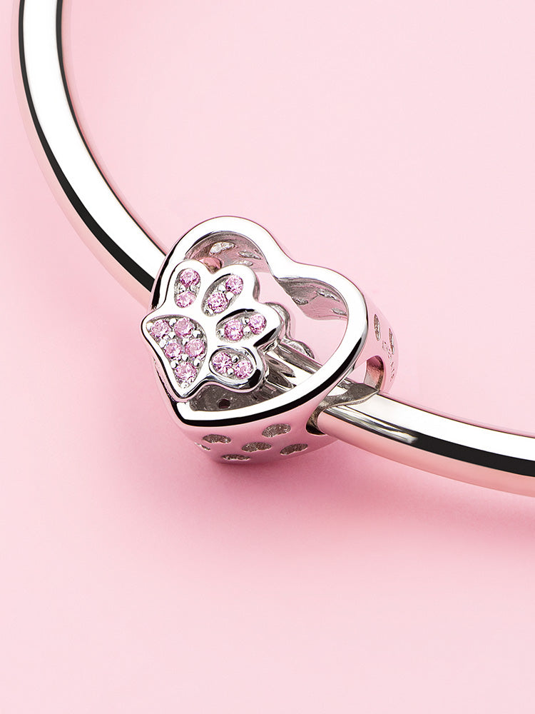 Paw in My Heart sterling silver charm bead displayed on charm bracelet