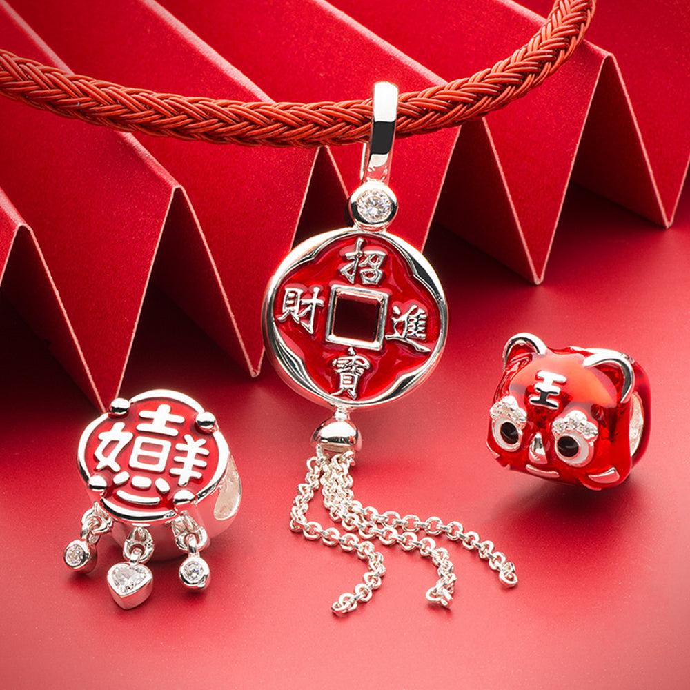 Lifestyle view of Peace Tassel 925 silver charm pendant on bracelet