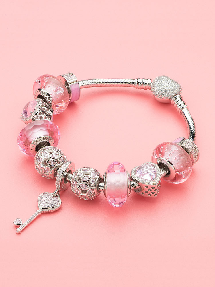 Sterling silver pink CZ charm bead jewelry styling on bracelet