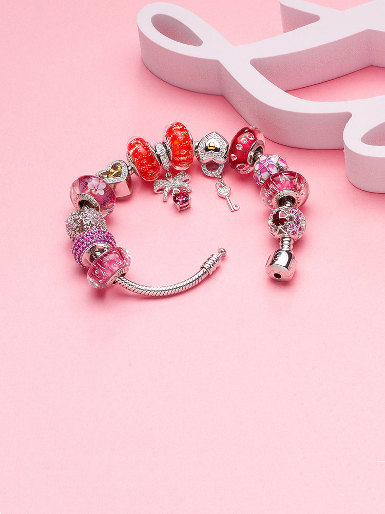 Petal shine murano glass charm paired with sterling silver charm bracelet