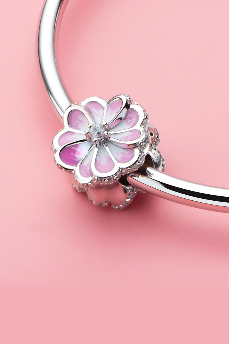Pink bloom enamel charm bead styled on bracelet
