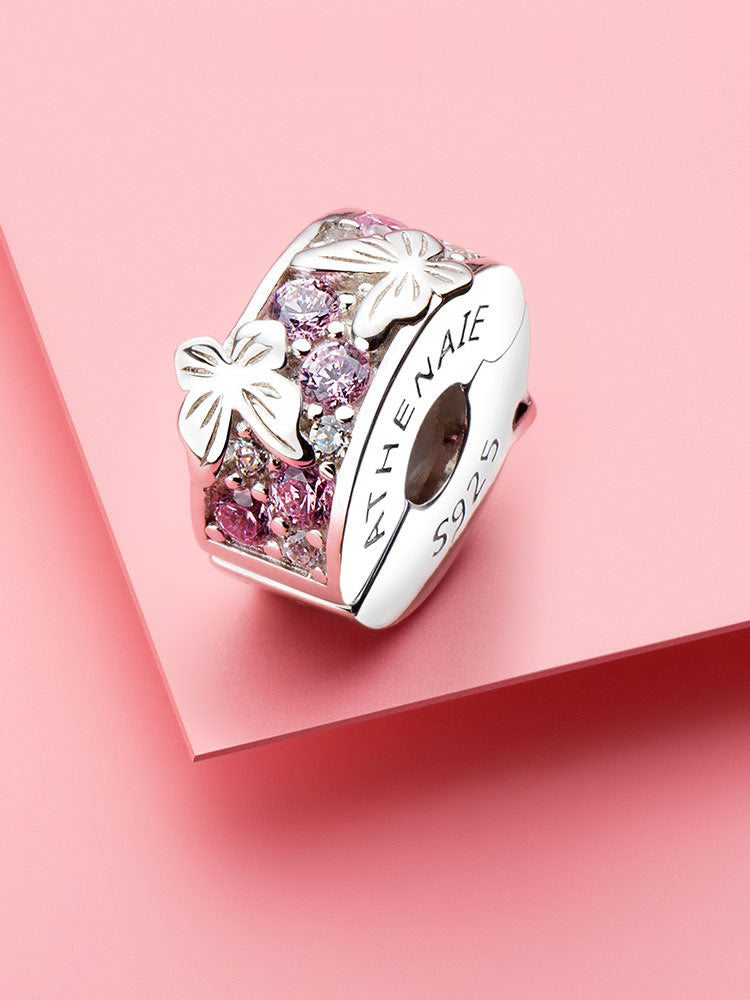 Pink butterfly safety chain stopper charm on bracelet